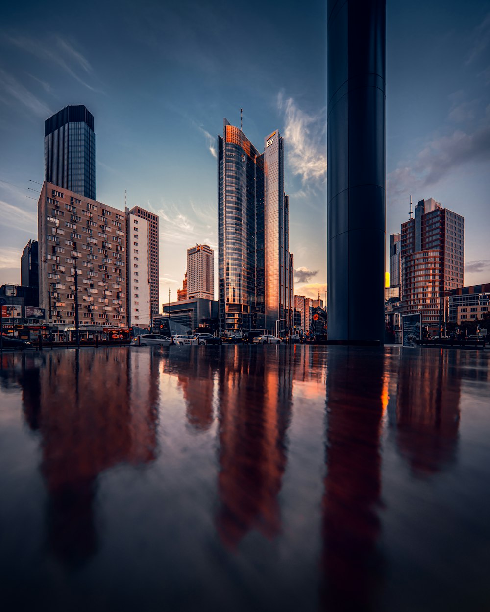 a city skyline with tall buildings