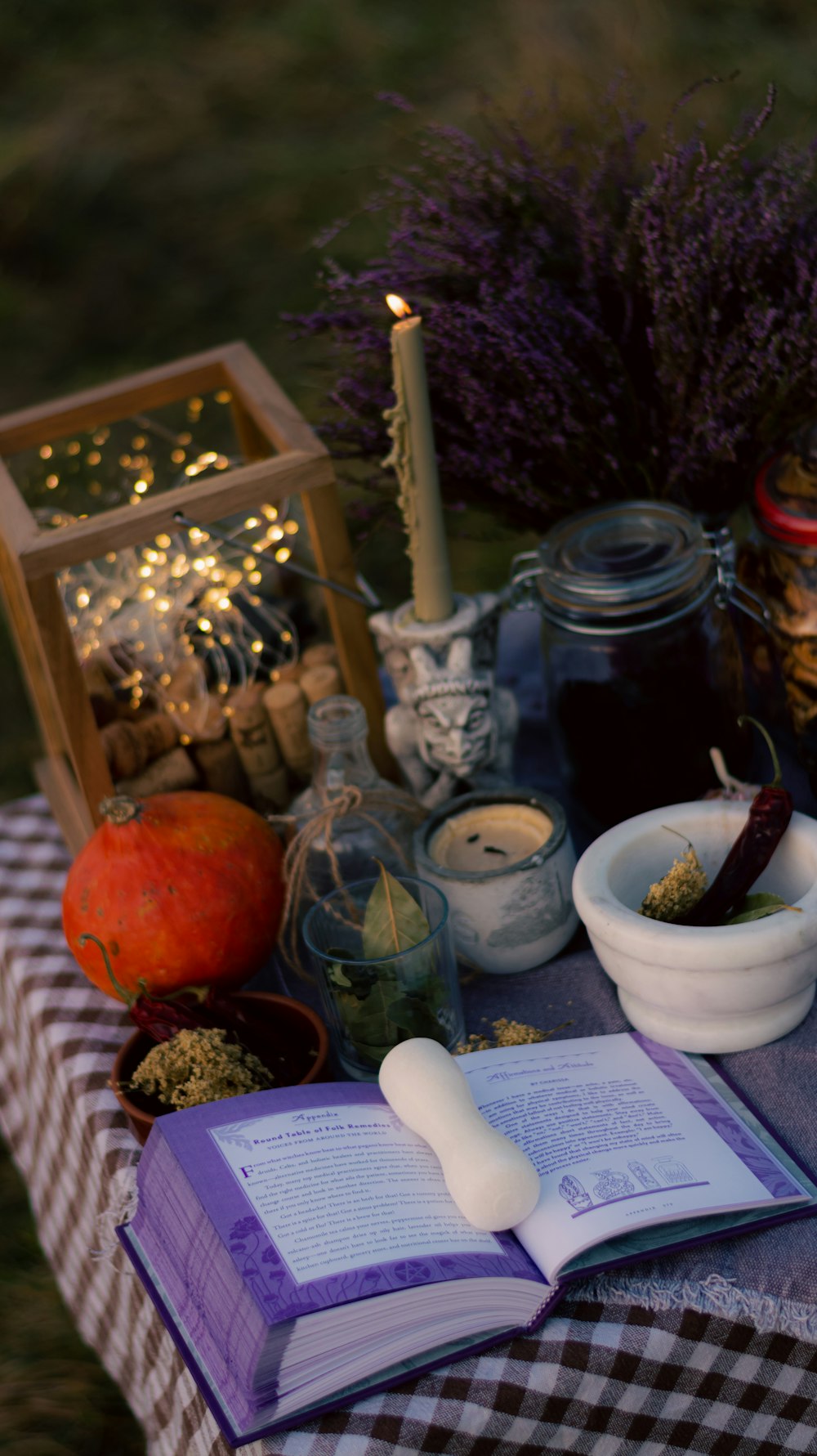 a table with candles and food on it