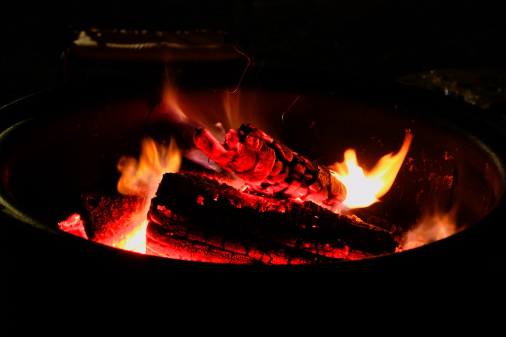 a fire pit with a flame