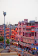 A vibrant street scene in Rajasthan with colorful markets and traditional attire.