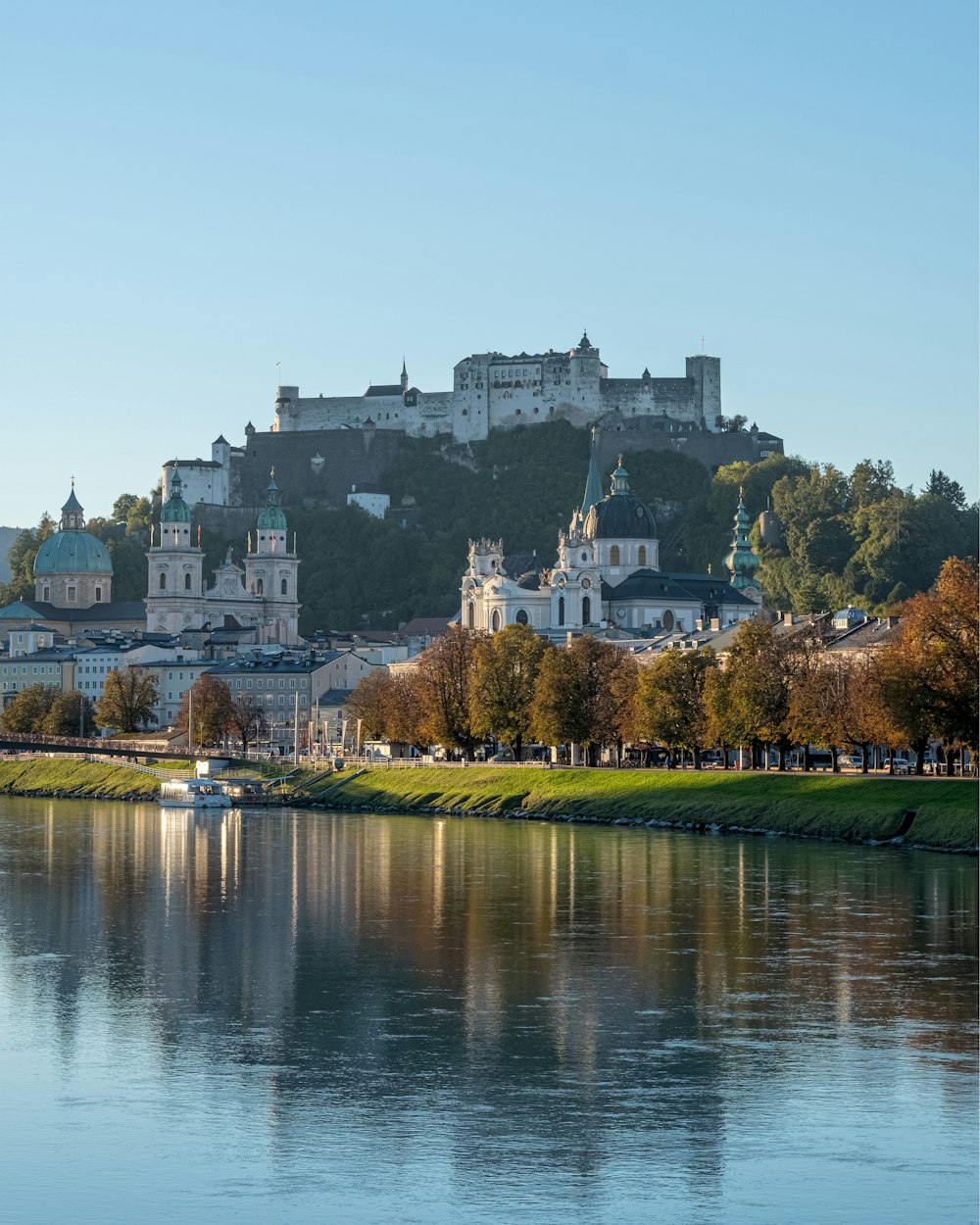 a body of water with a large building on the top of it