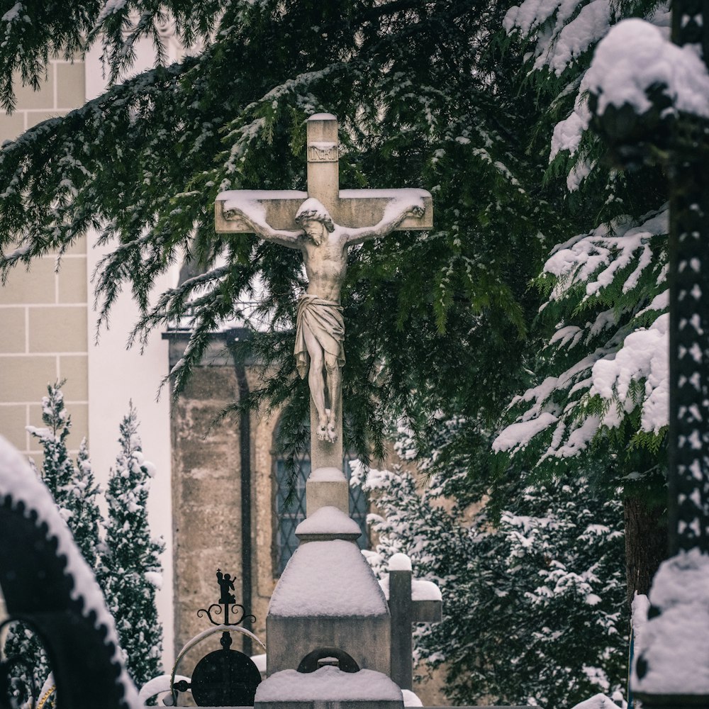 a statue in a cemetery