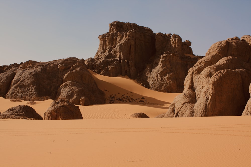 a desert landscape with large rocks