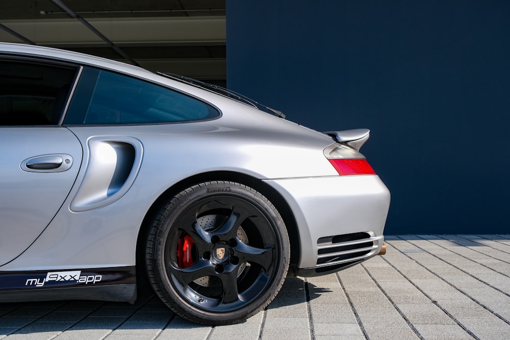 a silver car parked