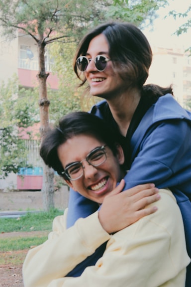 a woman hugging a man