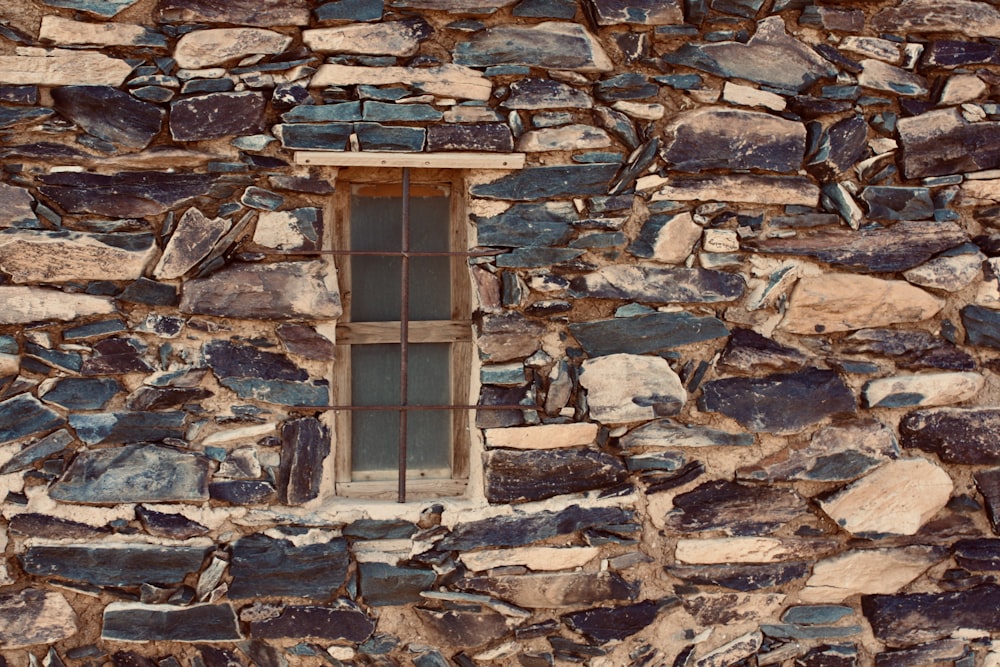 a window in a stone wall