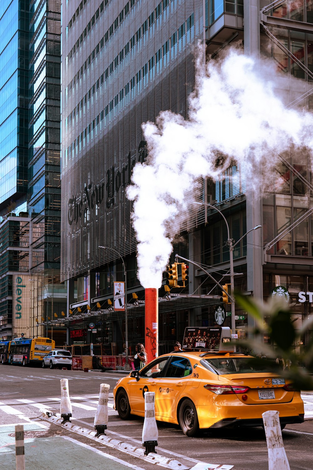 a yellow taxi on the street