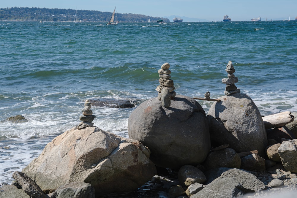 a group of rocks on a beach