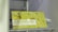 A sign is displayed with yellow and white colors featuring the text 'ELETRONIC TEMP. CONTROL' along with 'Soft Touch Digital Display.' The background has a soft yellow hue with circular patterns resembling bubbles or holes. The brand 'Homa' is visible along with a 20th-anniversary symbol.