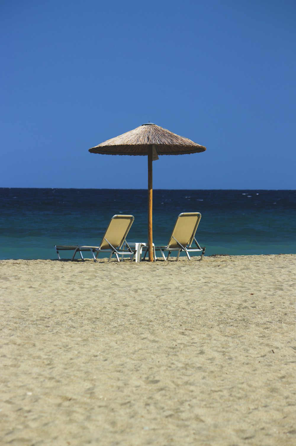 chairs and umbrella on beach