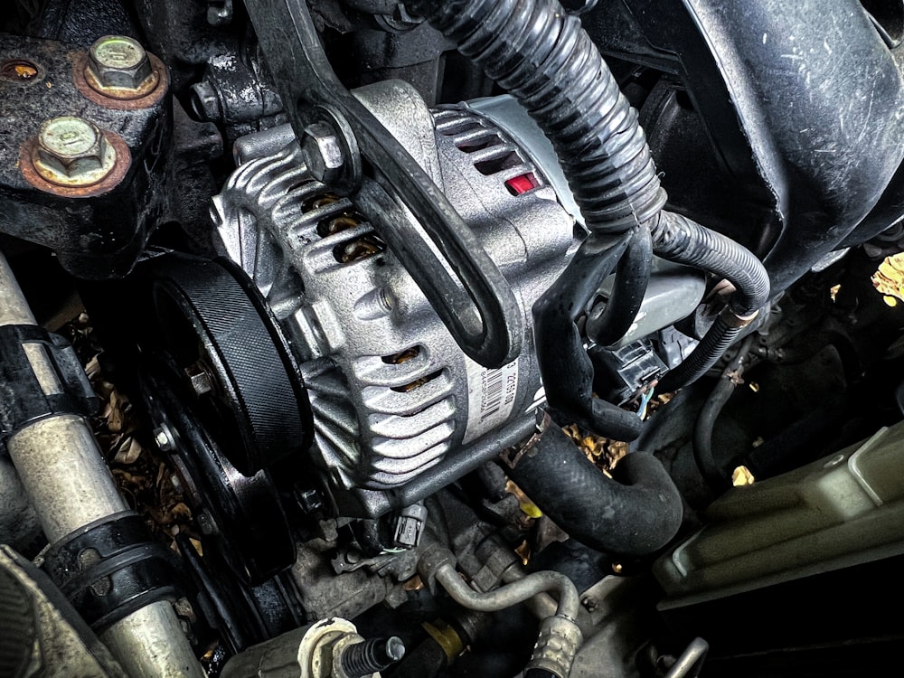 a car engine with a black hood