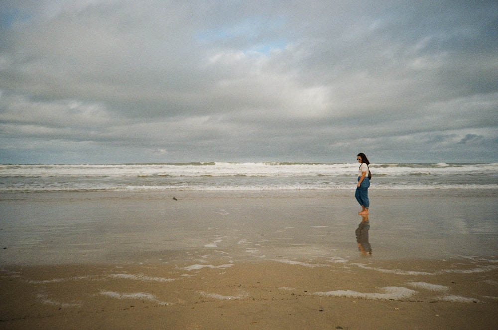 a man standing on a beach