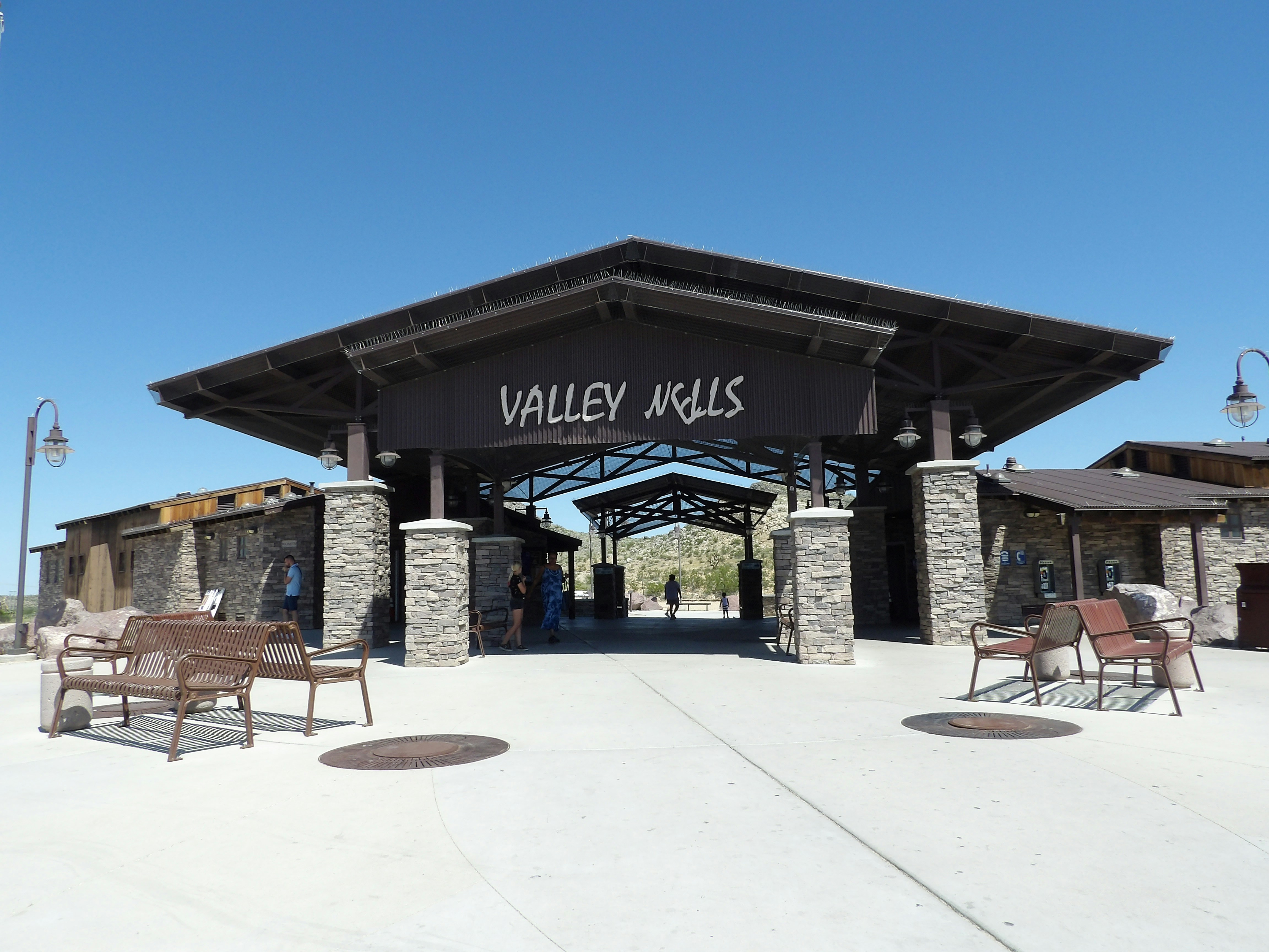 a building with a black awning