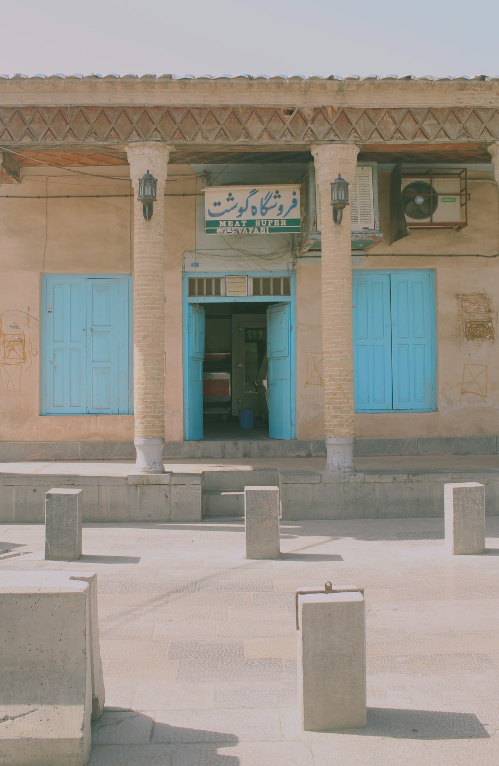 a building with blue doors