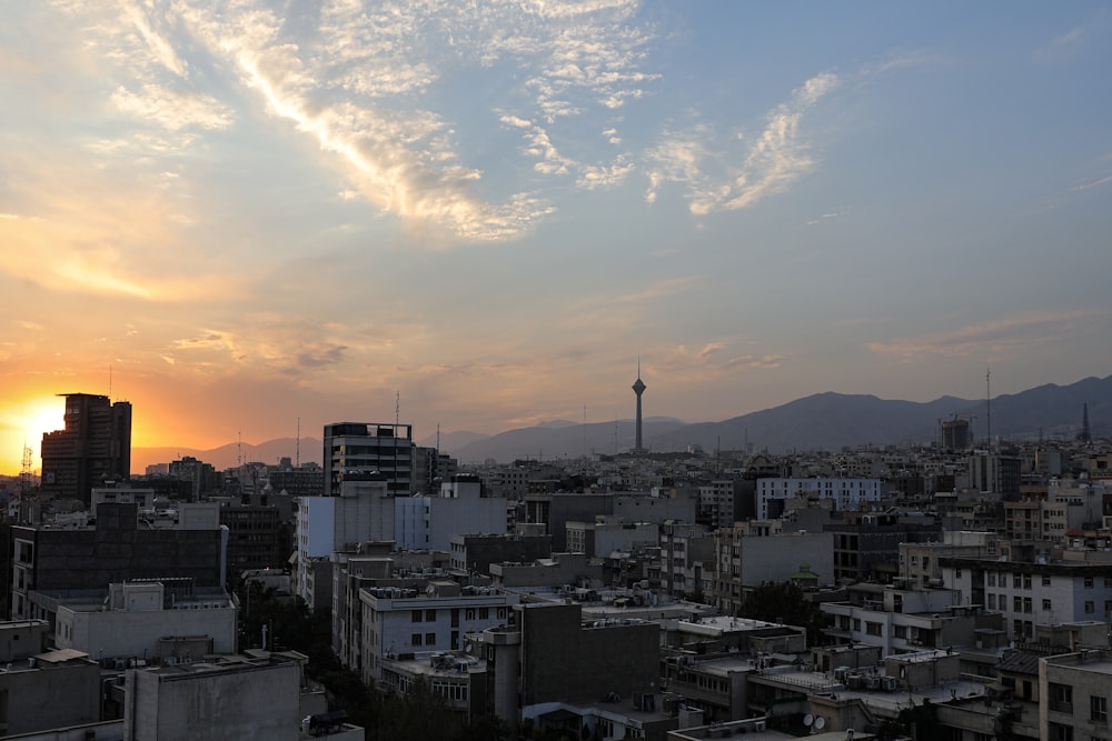 a city with a tower in the distance