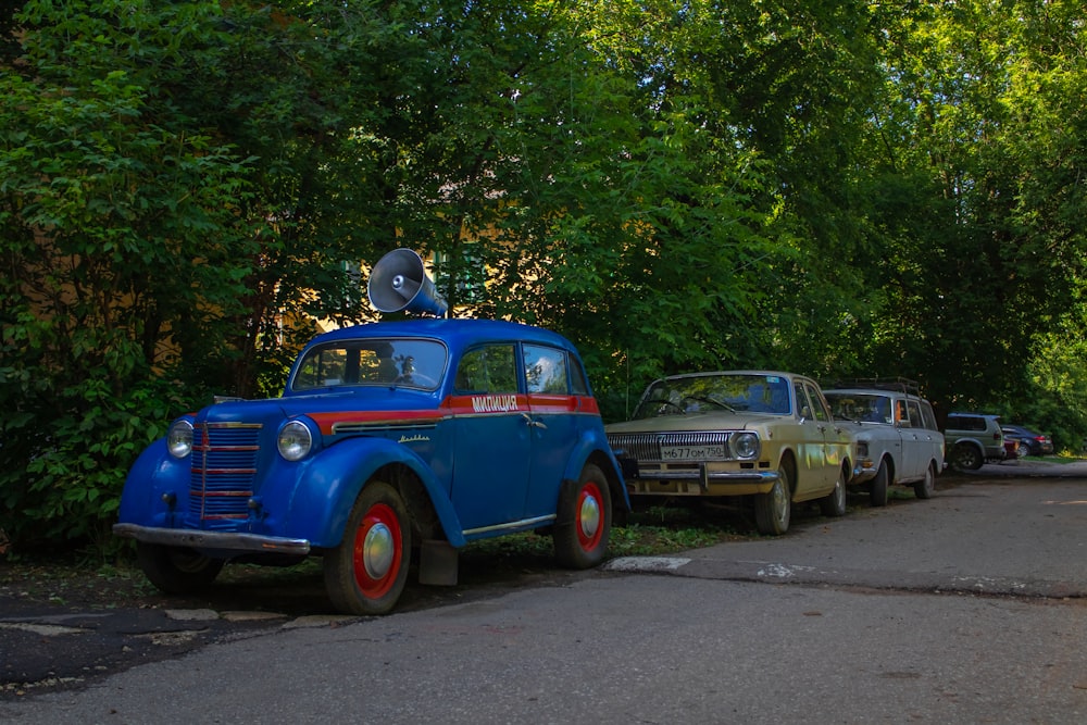 a group of cars parked on the side of a road