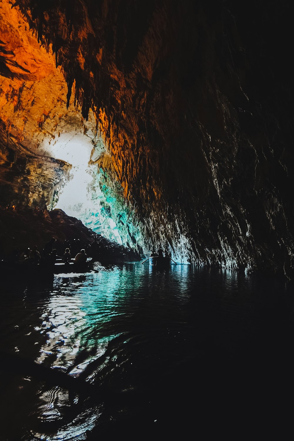 a cave with a body of water in it