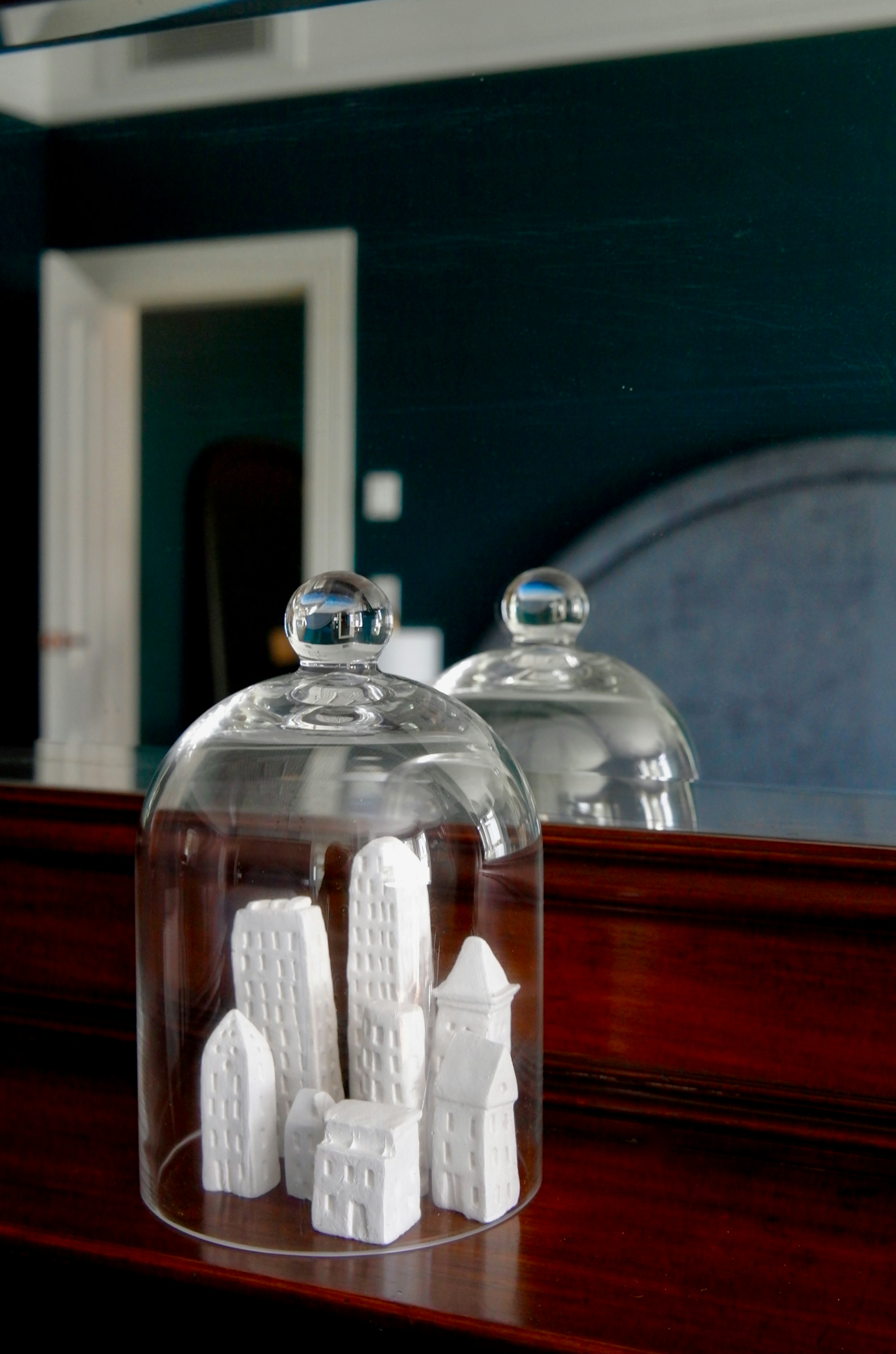 a glass bottle with white objects inside