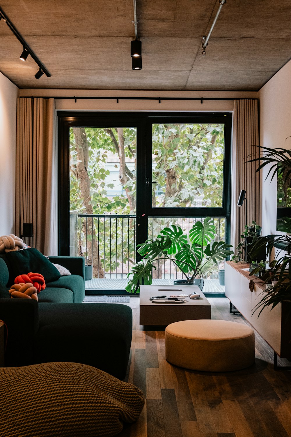 a living room with a large glass door