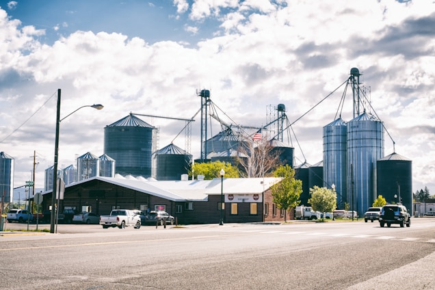 Photo of downtown Milnor with local businesses and community members engaging.