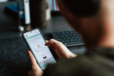 Close-up of a smartphone screen showing a text consultation about HVAC repair.
