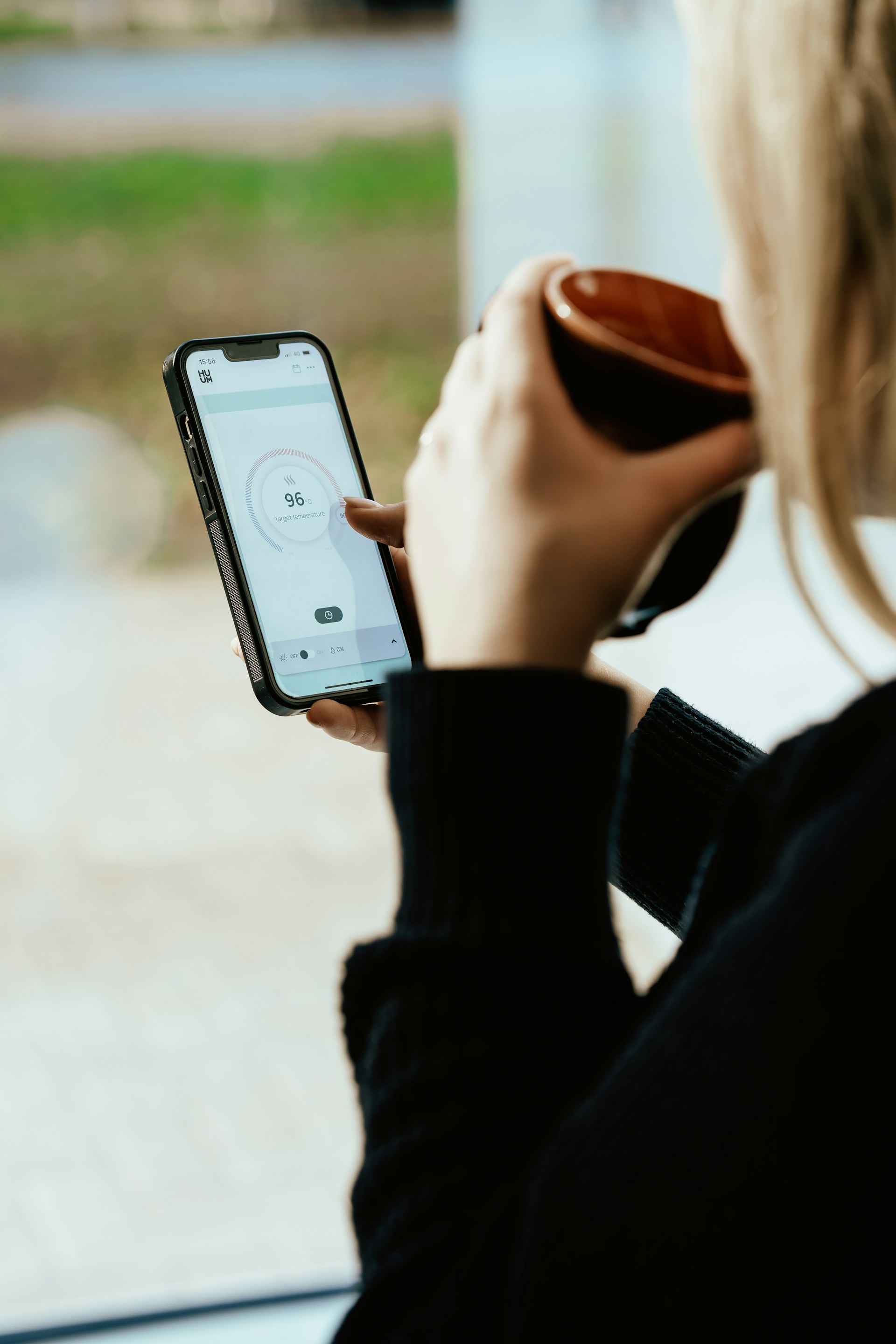 woman wearing yellow long-sleeved dress under white clouds and blue sky during daytime