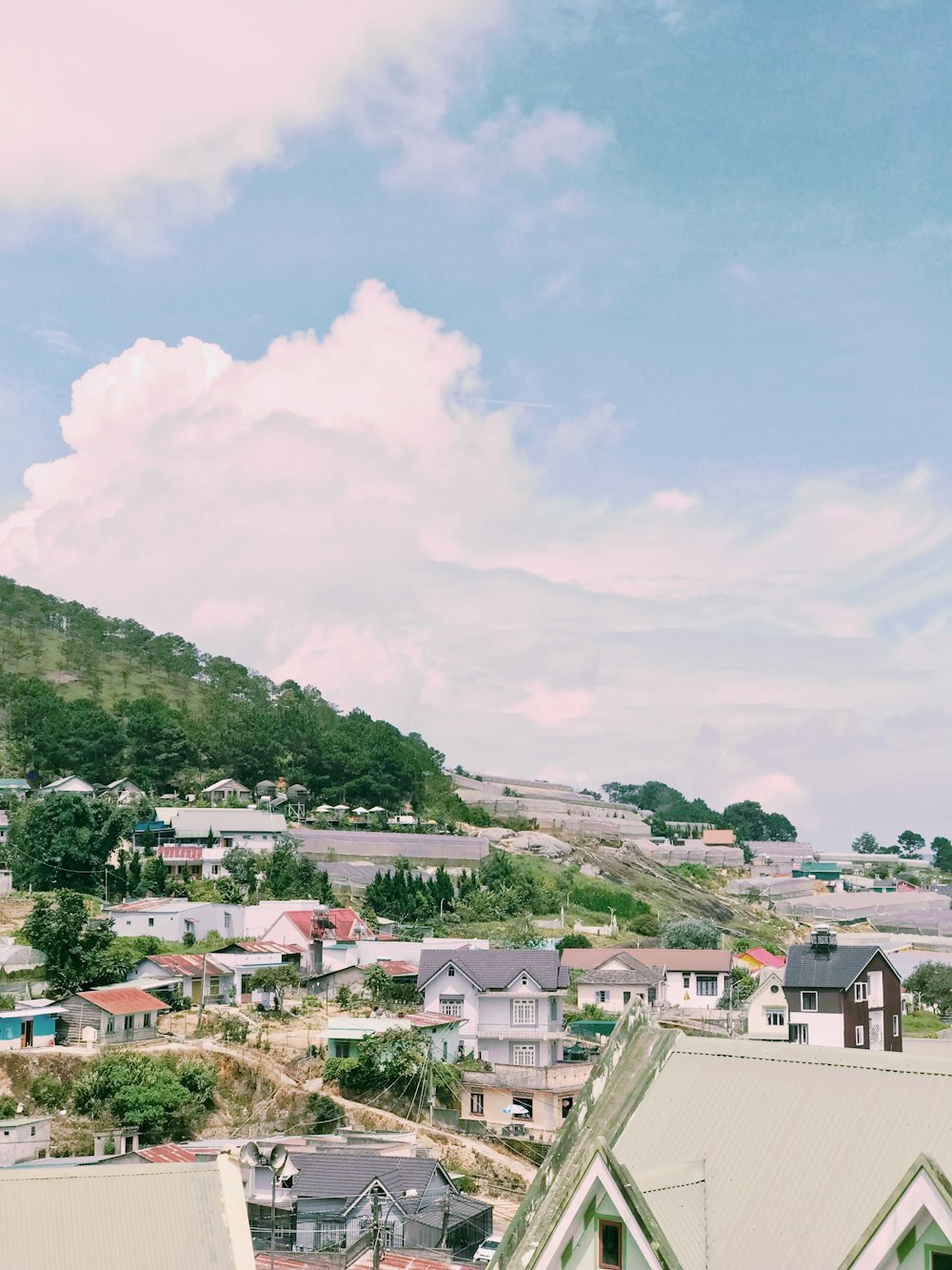 a town with a hill in the background