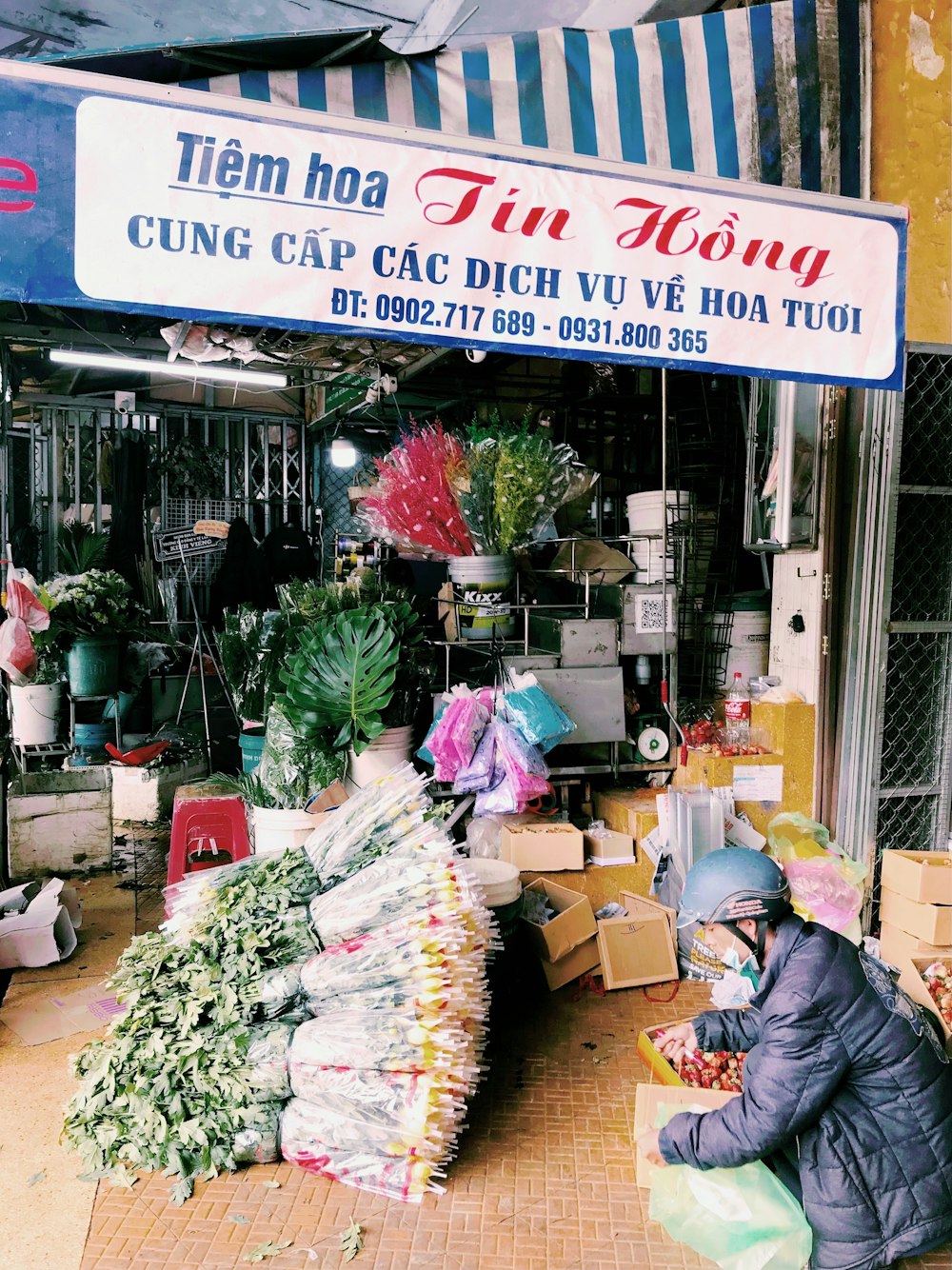 a person standing outside a store