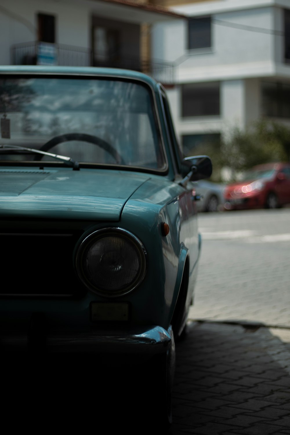 a car parked on the side of a street