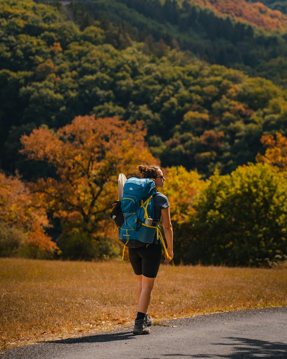 a man walking on a road