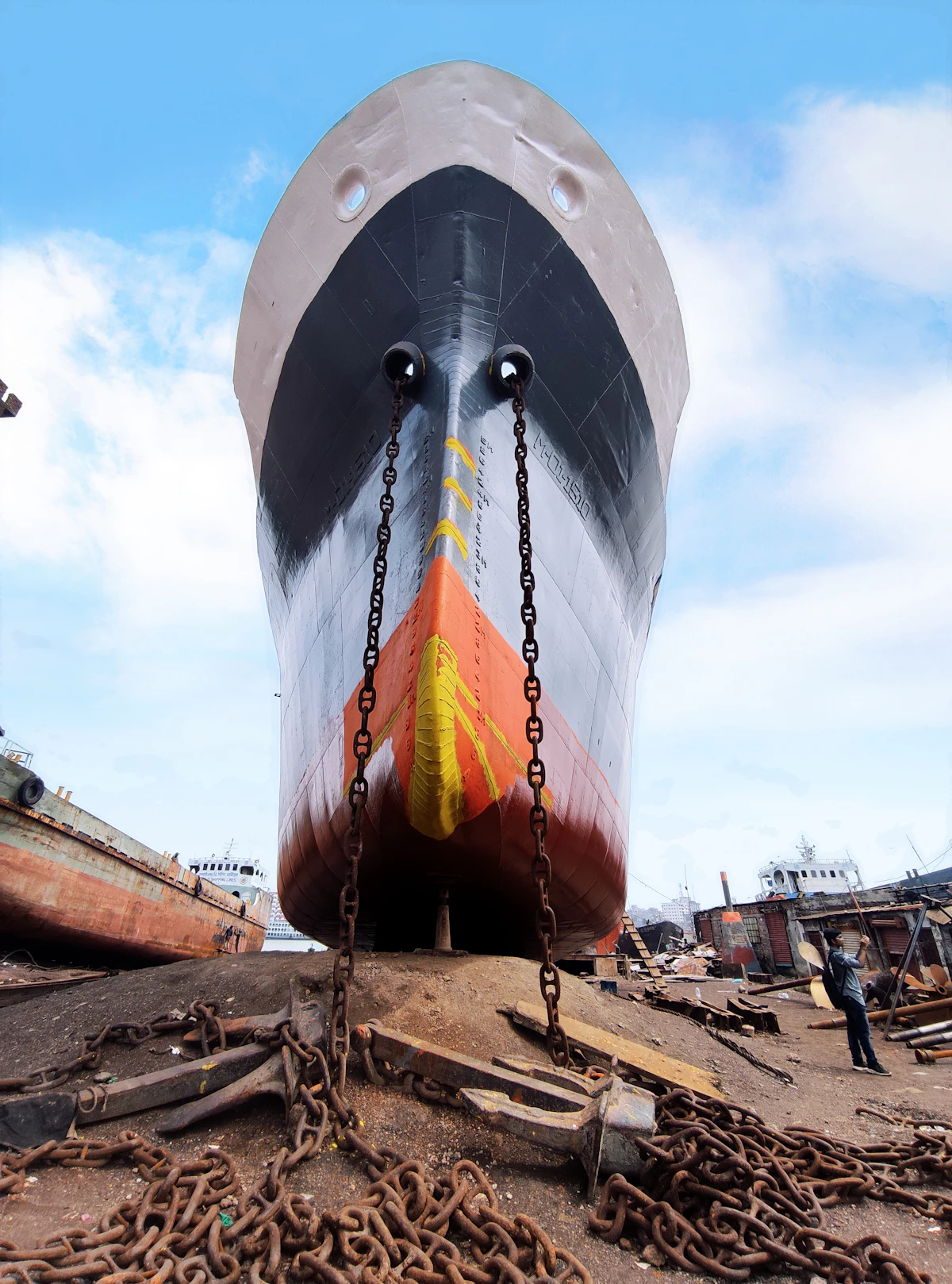 A cruise ship under construction at a shipyard