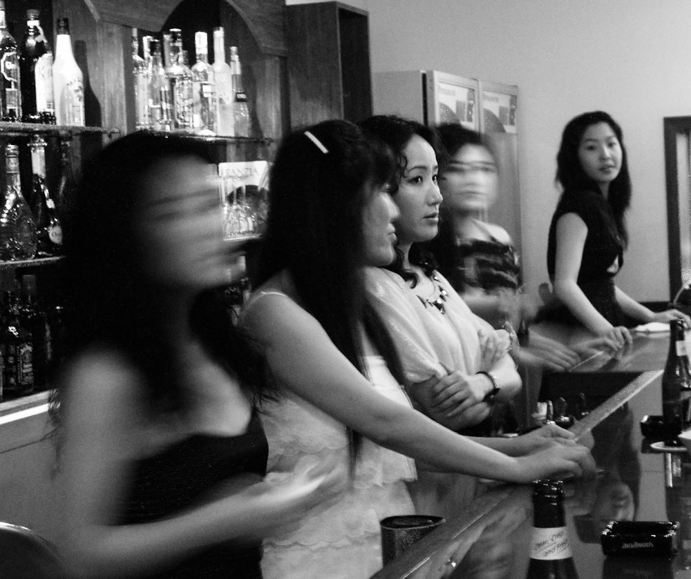 a group of women in a bar