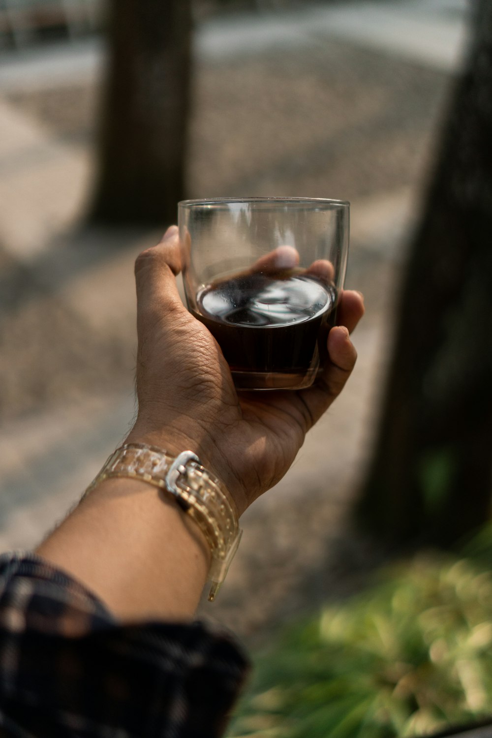 a person holding a glass of wine