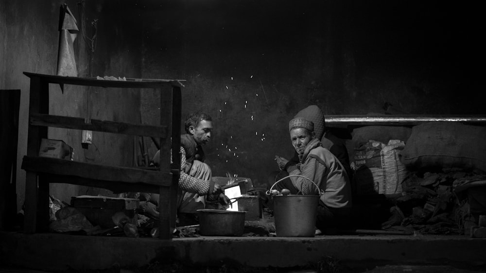 a group of women cooking in a kitchen