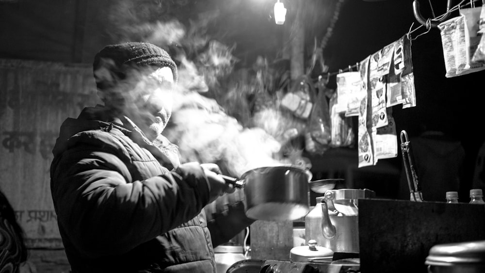 a person cooking in a kitchen