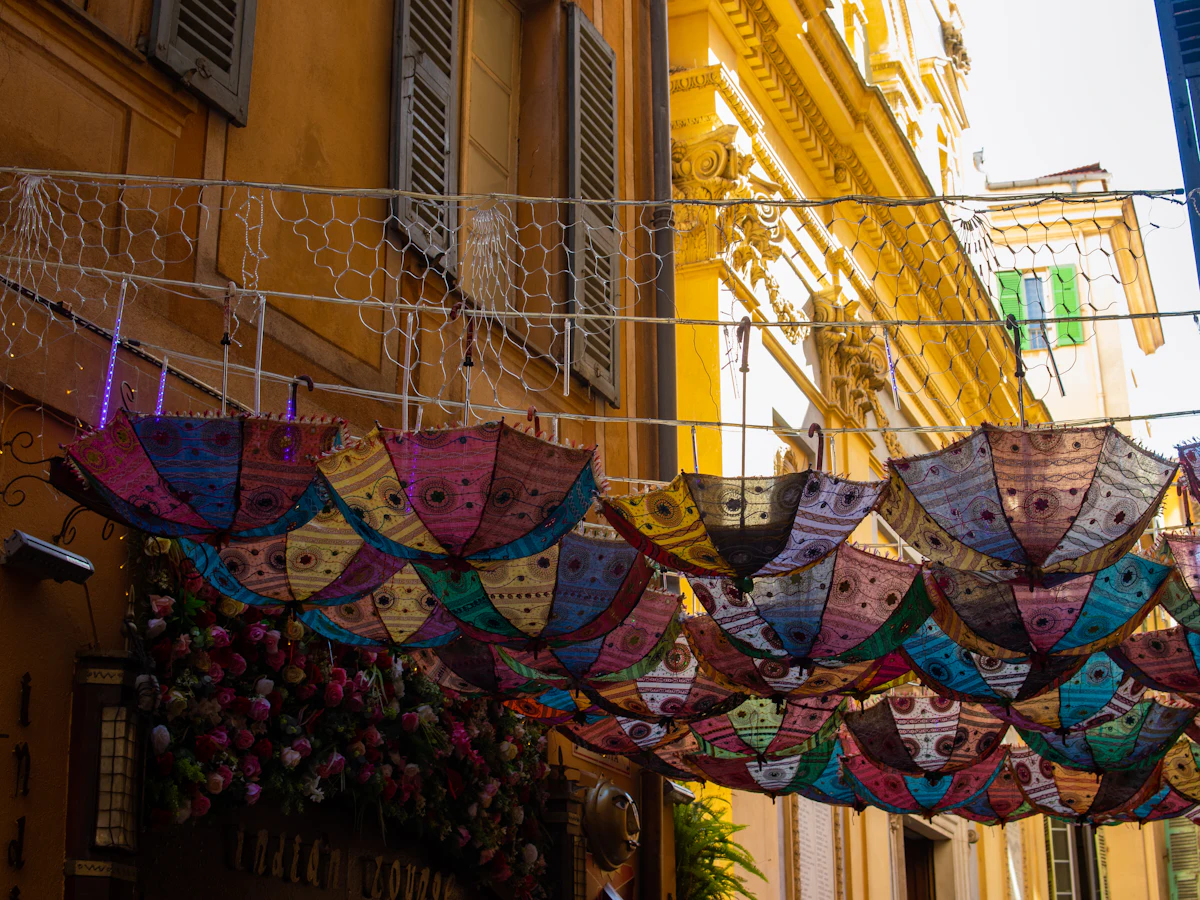 Colourful umbrellas hanging over a street