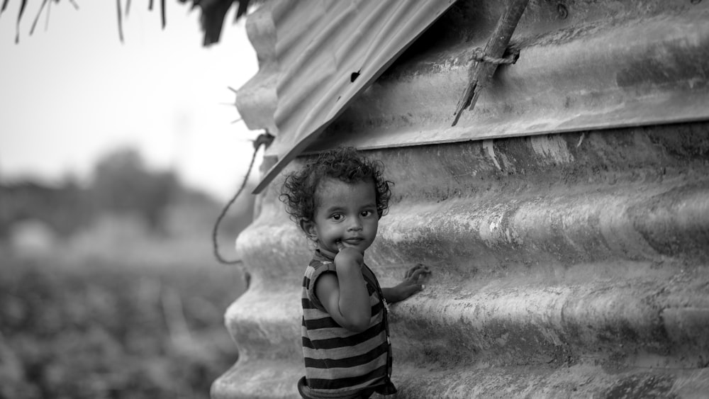 a child holding a stick