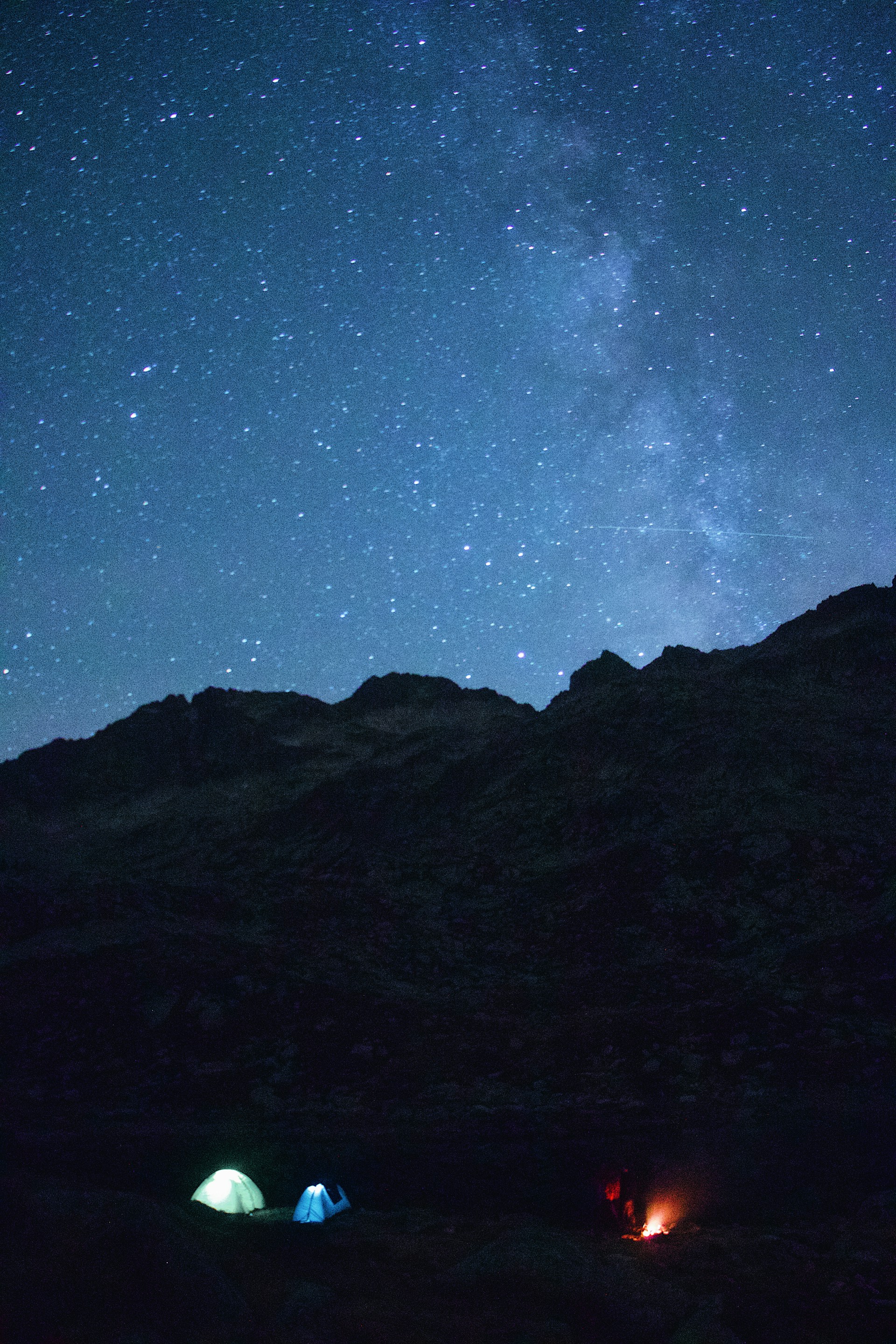 a mountain with a starry sky above it