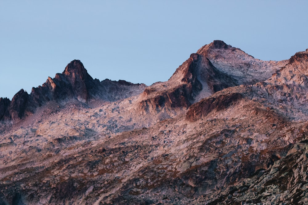 a close up of a rock mountain in the background