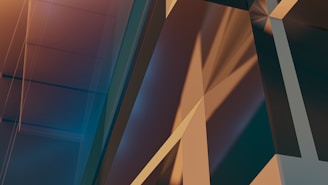 Abstract geometric shapes create a complex composition, with sharp lines and intersecting planes of translucent material. The interplay of light creates interesting shadows and highlights, giving depth and dimension to the scene.