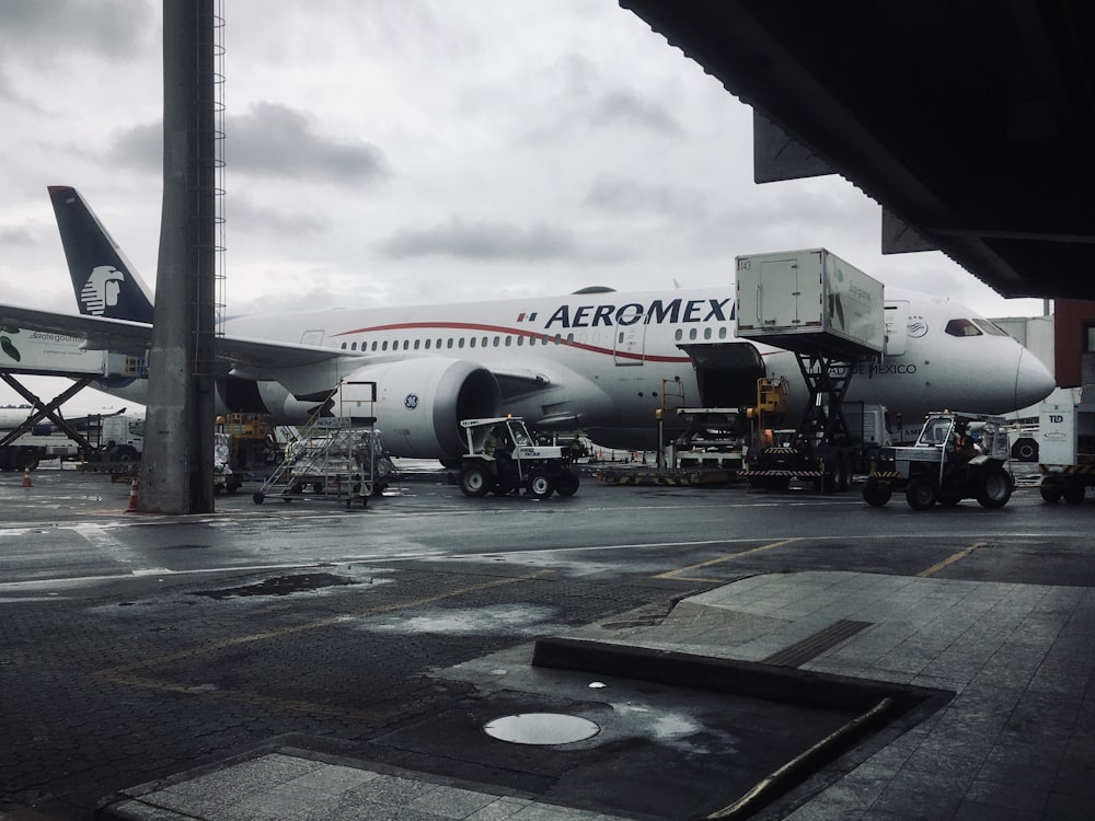 a large airplane is parked at an airport