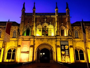 Evening view of a cultural building hosting an exclusive art event for our group tours