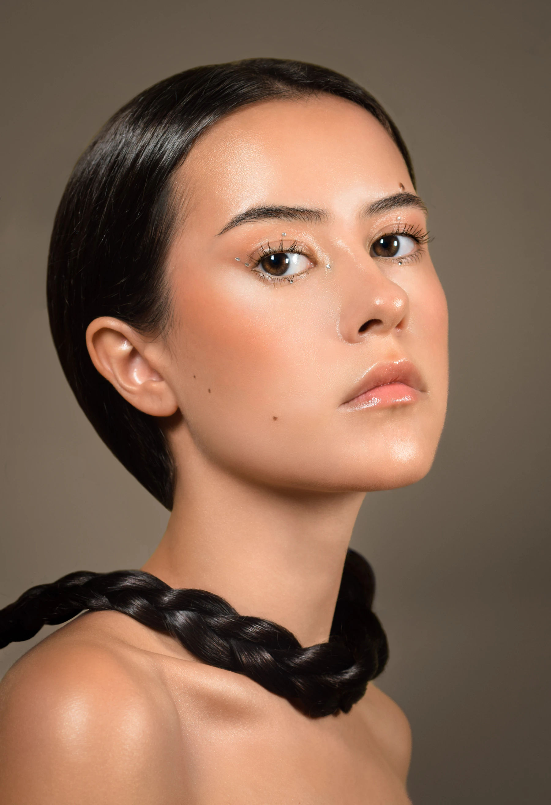 Clean editorial beauty portrait with luminous skin