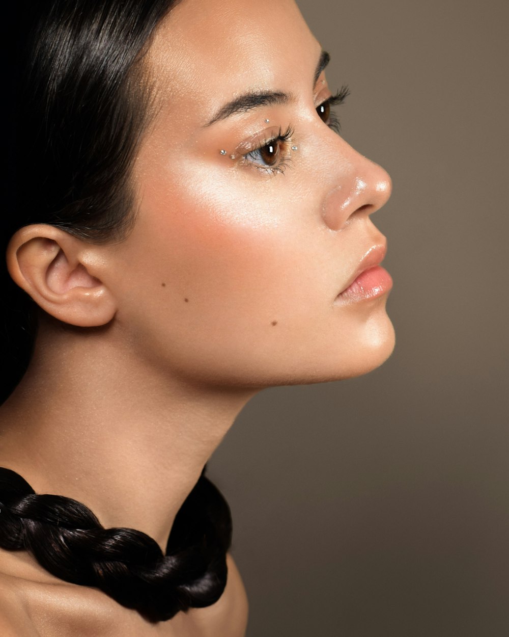 a woman with a black bow tie