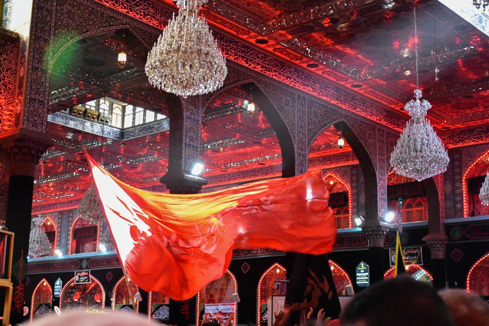 a large red and gold dragon statue