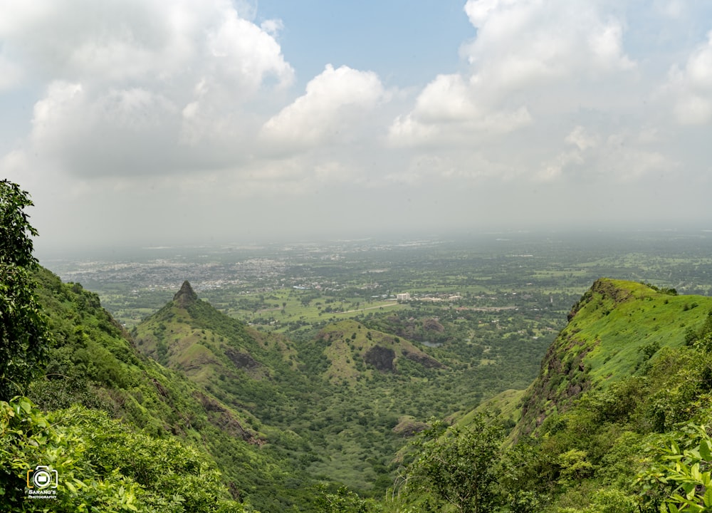 a landscape with hills and trees