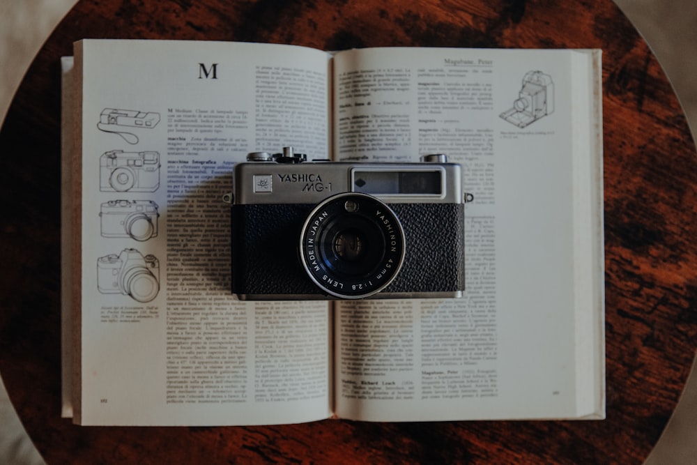 a camera on a book