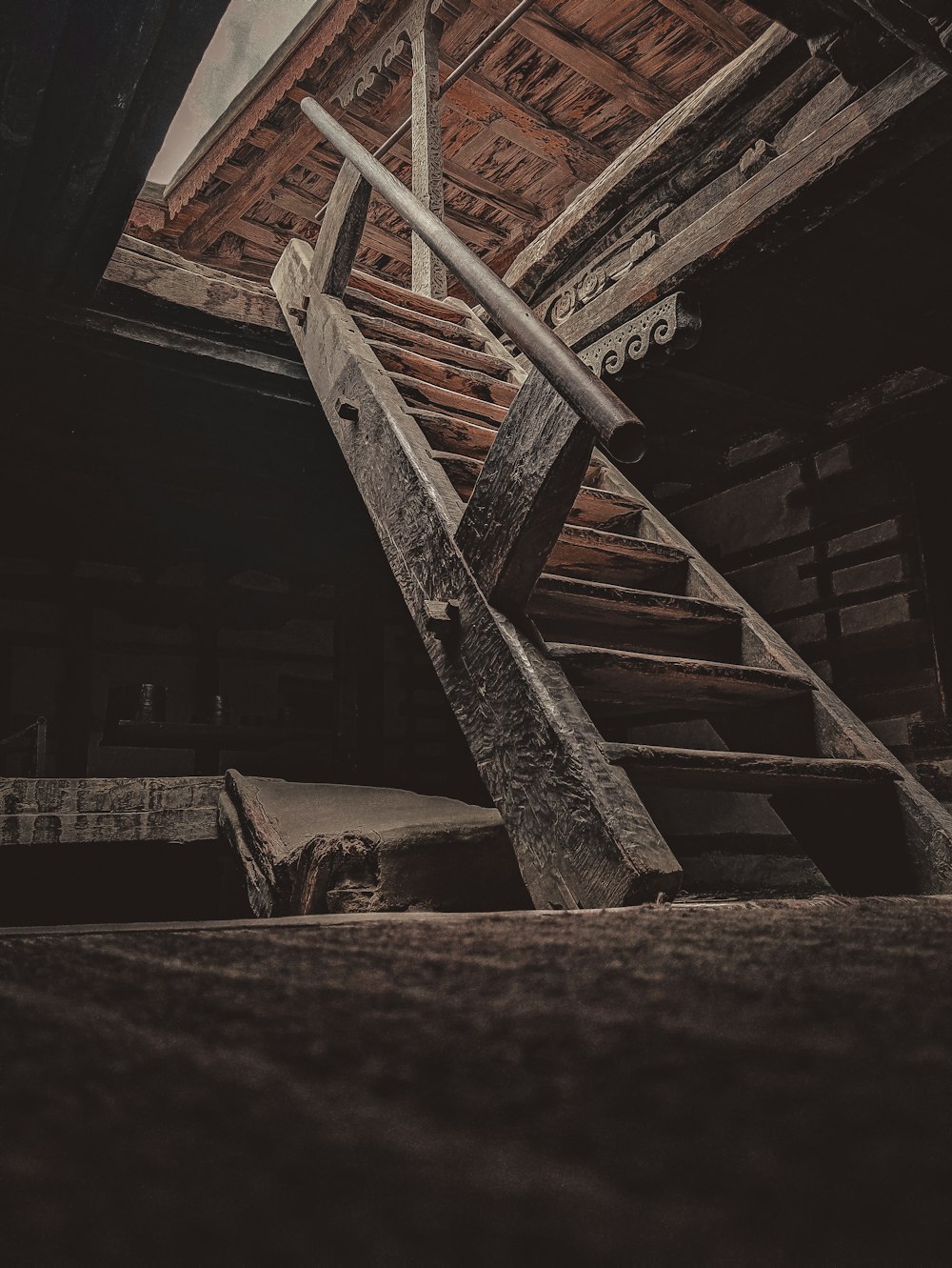 a staircase with a metal railing