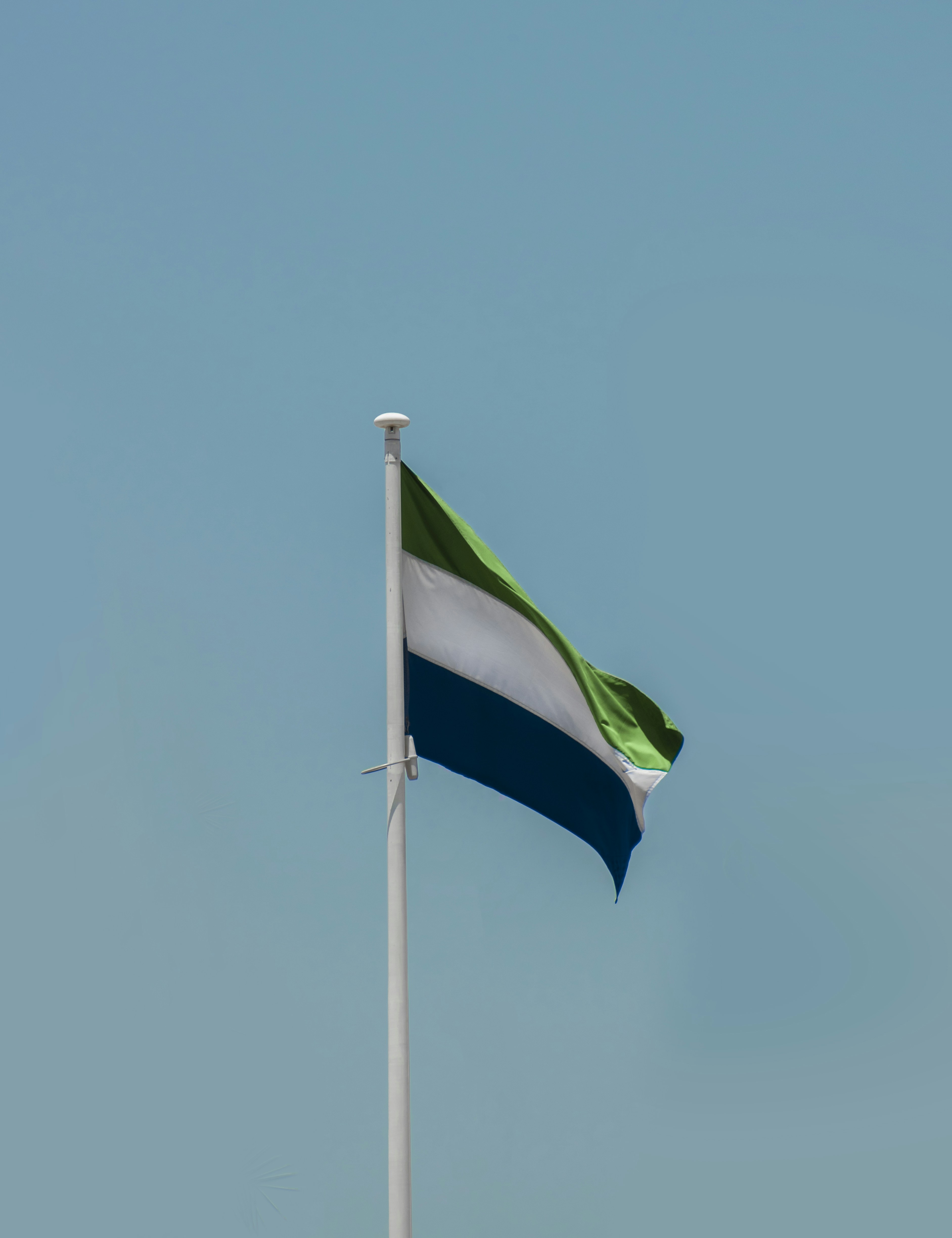 A flag on a pole photo – Free Sierra leone Image on Unsplash