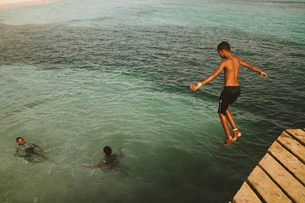 a group of people in the water